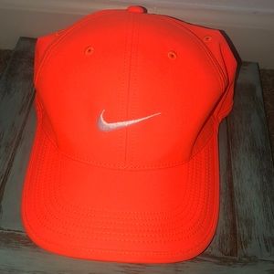 neon orange and white nike cap